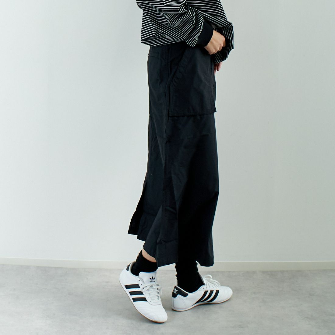 THE NORTH FACE [ザ ノースフェイス] コンパクトスカート [NBW32330] K &&モデル身長：167cm 着用サイズ：M&&