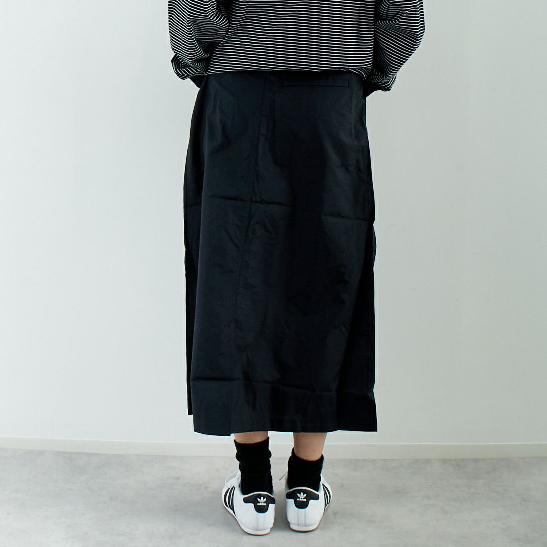 THE NORTH FACE [ザ ノースフェイス] コンパクトスカート [NBW32330] K &&モデル身長：167cm 着用サイズ：M&&