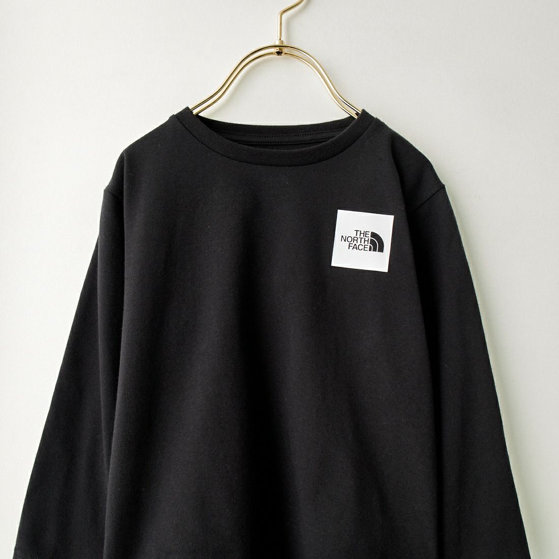 THE NORTH FACE [ザ ノースフェイス] ロングスリーブスモールスクエアロゴTシャツ [NTJ32357] Ｋﾌﾞﾗｯｸ