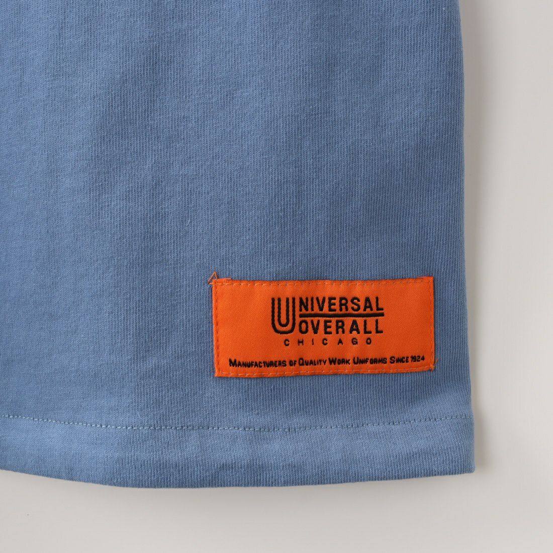 UNIVERSAL OVERALL [ユニバーサルオーバーオール] 別注 ショートスリーブスタジャンTシャツ [U2311201IN-JF] SAX