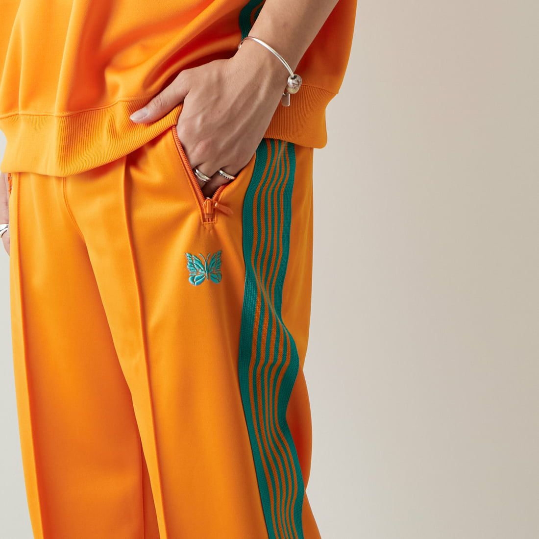 Needles [ニードルズ] 別注 トラックパンツ [MR560-JF] ORANGE