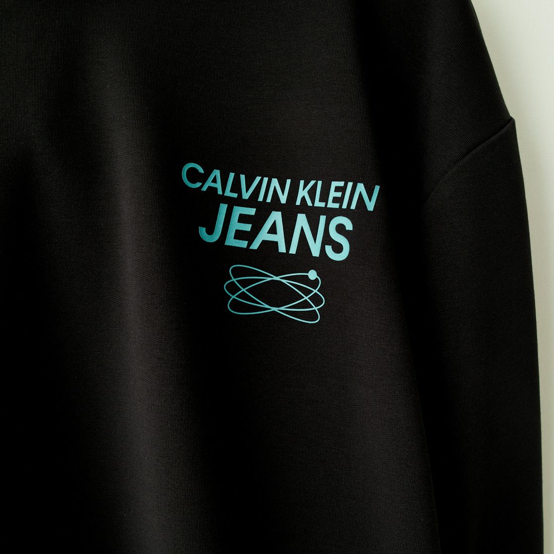 Calvin Klein Jeans [カルバンクライン ジーンズ] フューチャーギャラクシーロゴパーカー [J30J324473]