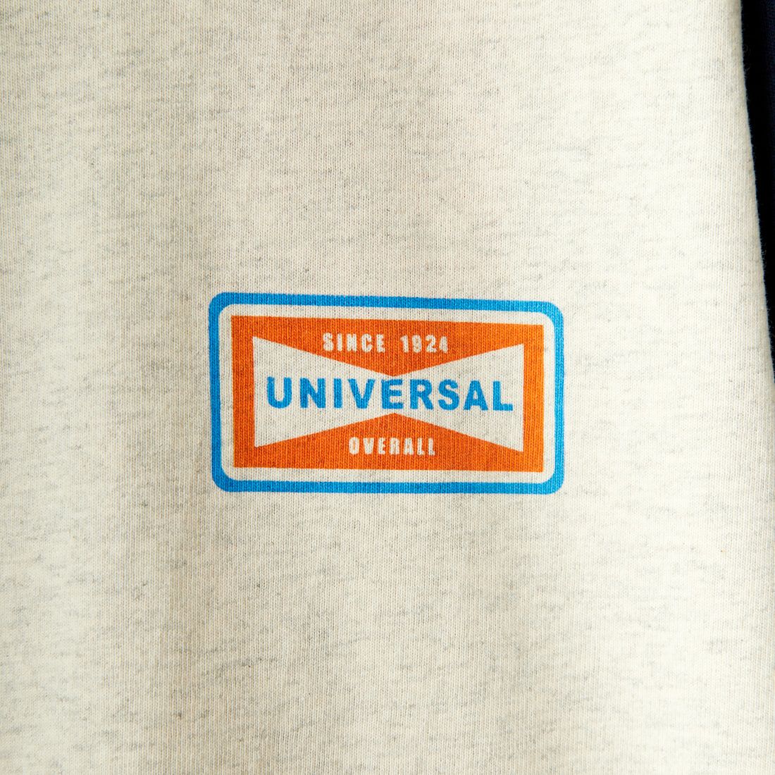 UNIVERSAL OVERALL [ユニバーサルオーバーオール] 別注 7分袖 ラグランスリーブTシャツ [U2412210IN-JF] OAT/NVY