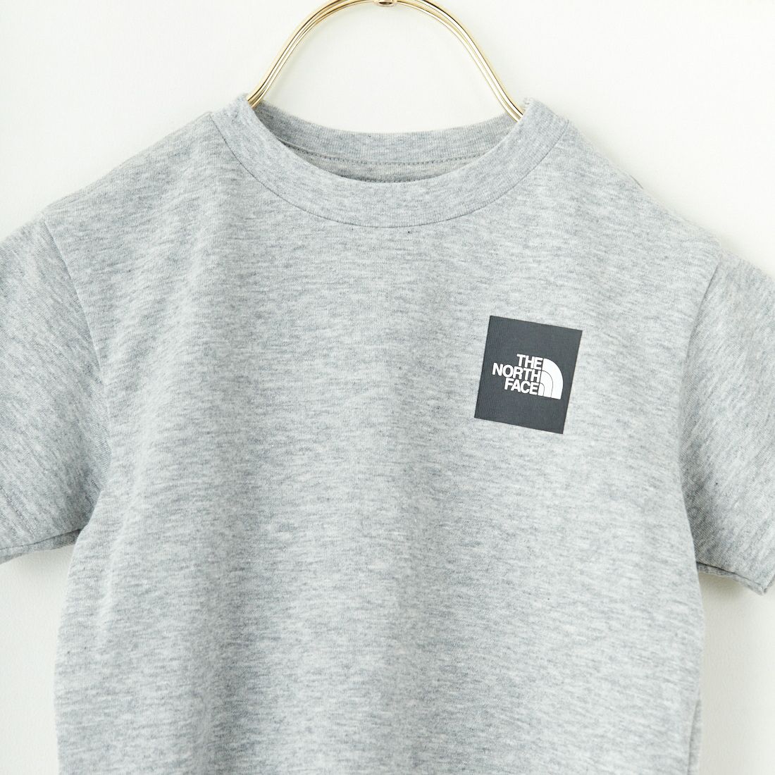 THE NORTH FACE [ザ ノースフェイス] ショートスリーブスモールスクエアロゴティー(ベビー) [NTB32358] Z