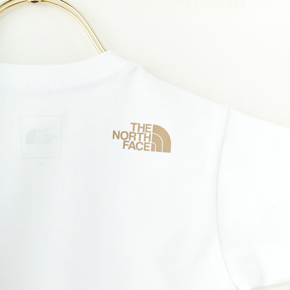 THE NORTH FACE [ザ ノースフェイス] ショートスリーブスモールスクエアロゴティー(ベビー) [NTB32358] WH