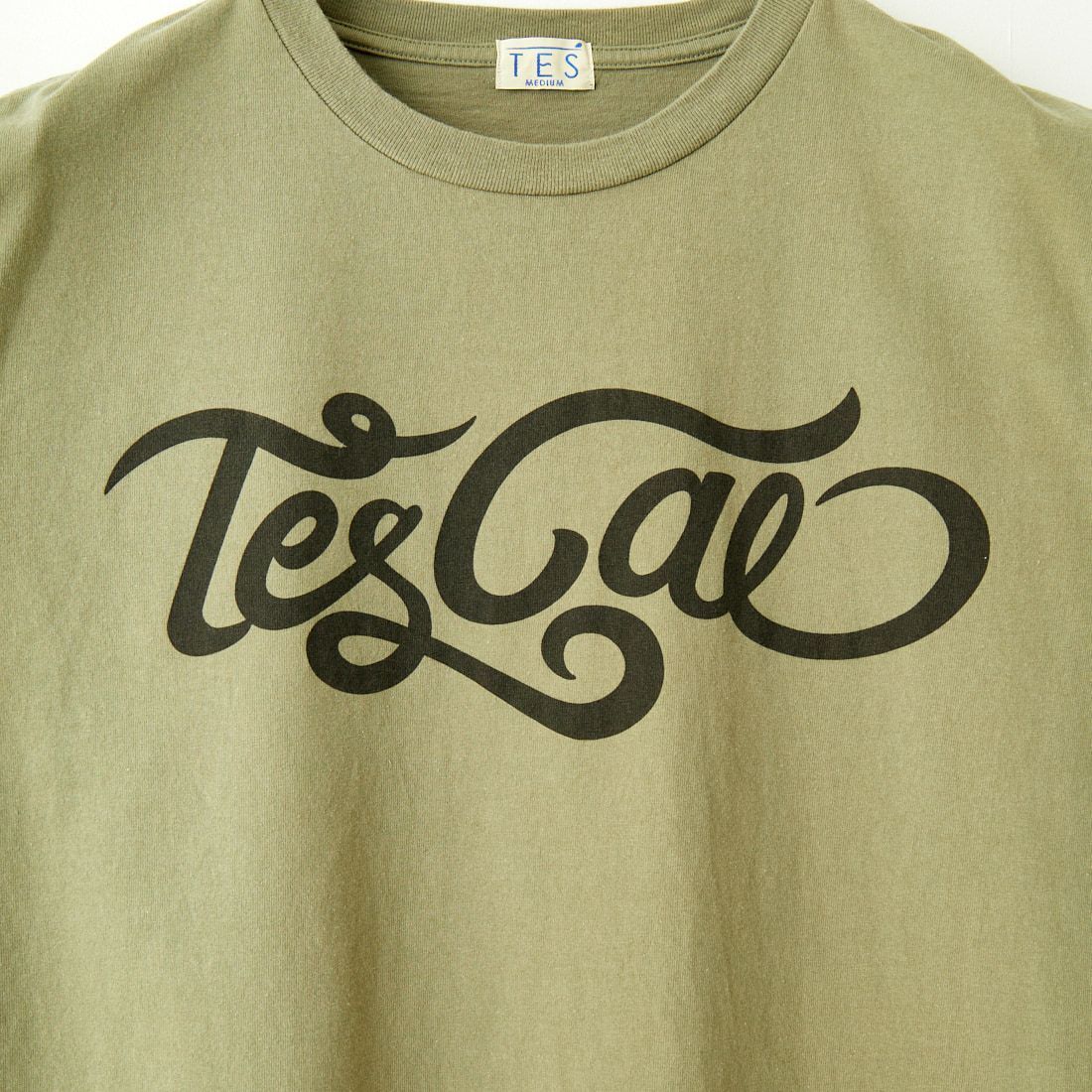 The Endless Summer [エンドレスサマー] TES CAL オールドサインプリントTシャツ [FT-24574343] 31 KHAKI