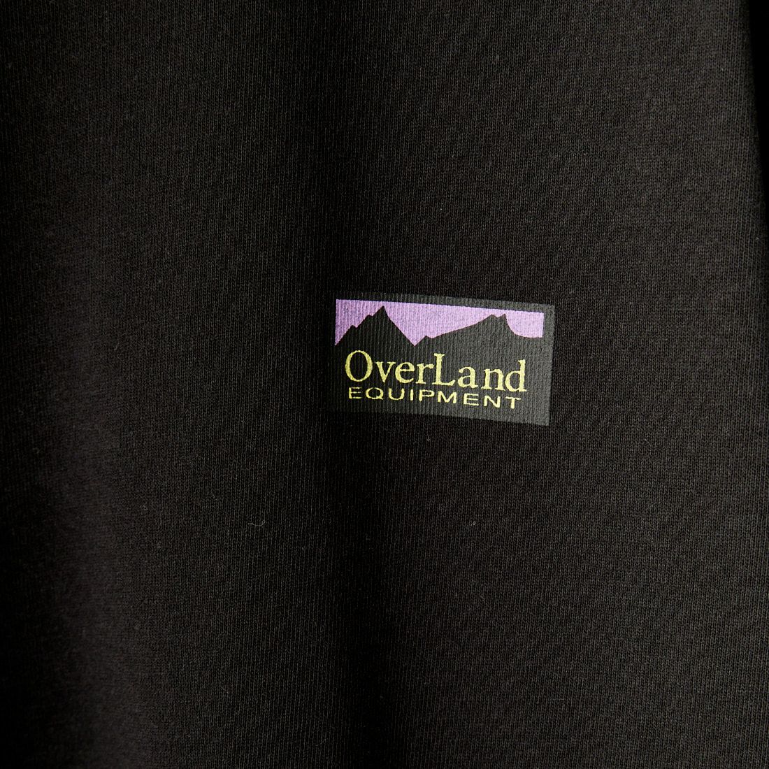 OverLand EQUIPMENT [オーバーランドイクイップメント] 別注 ブランドロゴ バックプリントTシャツ [OL1-CST-IN4-JF] BLACK