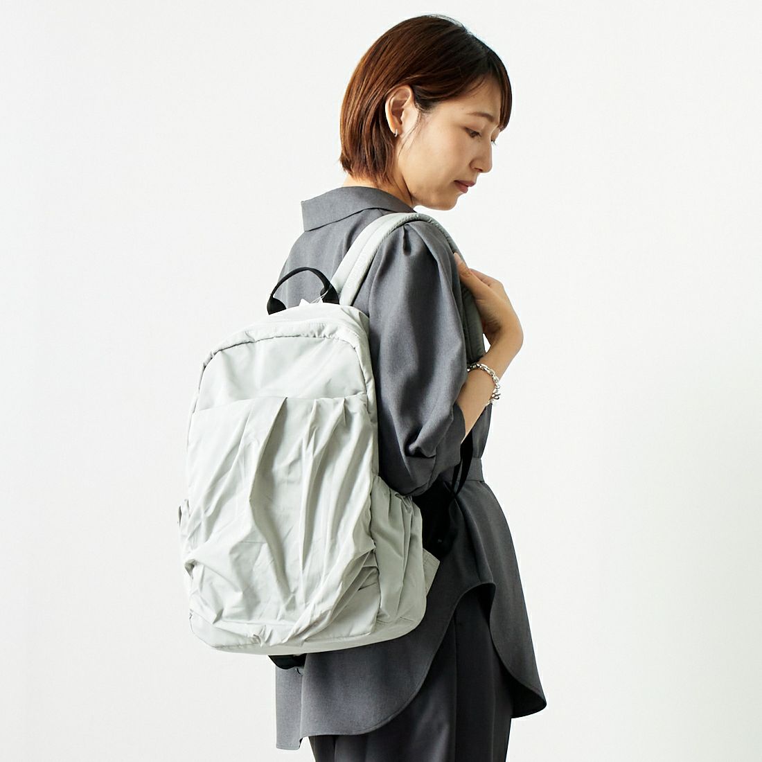 emmi [エミ] エコ撥水ギャザーボディーバックパック [13WGB239304] L.GRY