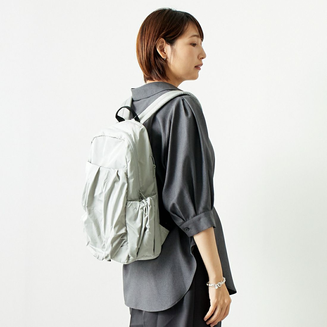 emmi [エミ] エコ撥水ギャザーボディーバックパック [13WGB239304] L.GRY