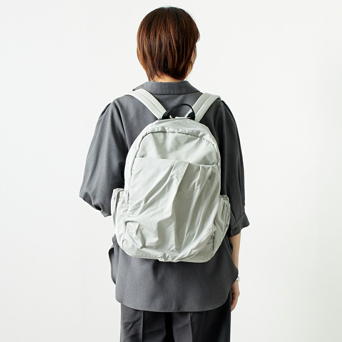 emmi [エミ] エコ撥水ギャザーボディーバックパック [13WGB239304] L.GRY