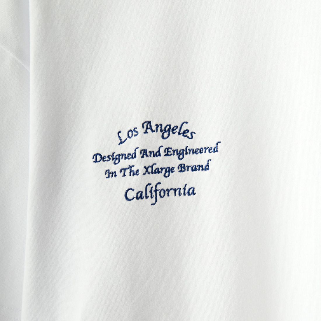 XLARGE [エクストララージ] LAバーシティー ショートスリーブTシャツ [101243011008] WHITE