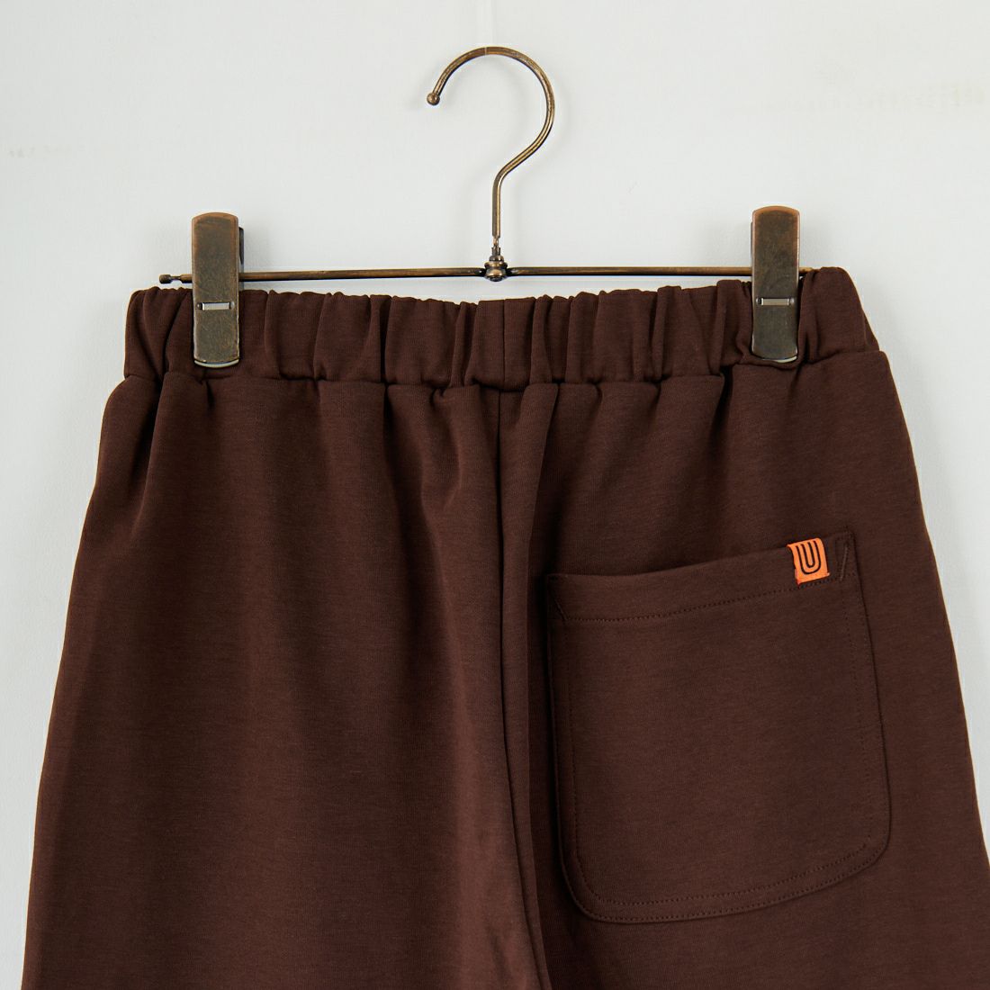 UNIVERSAL OVERALL [ユニバーサルオーバーオール] 別注 ポンチスウェットイージーパンツ [U2422601IN-JF] BROWN