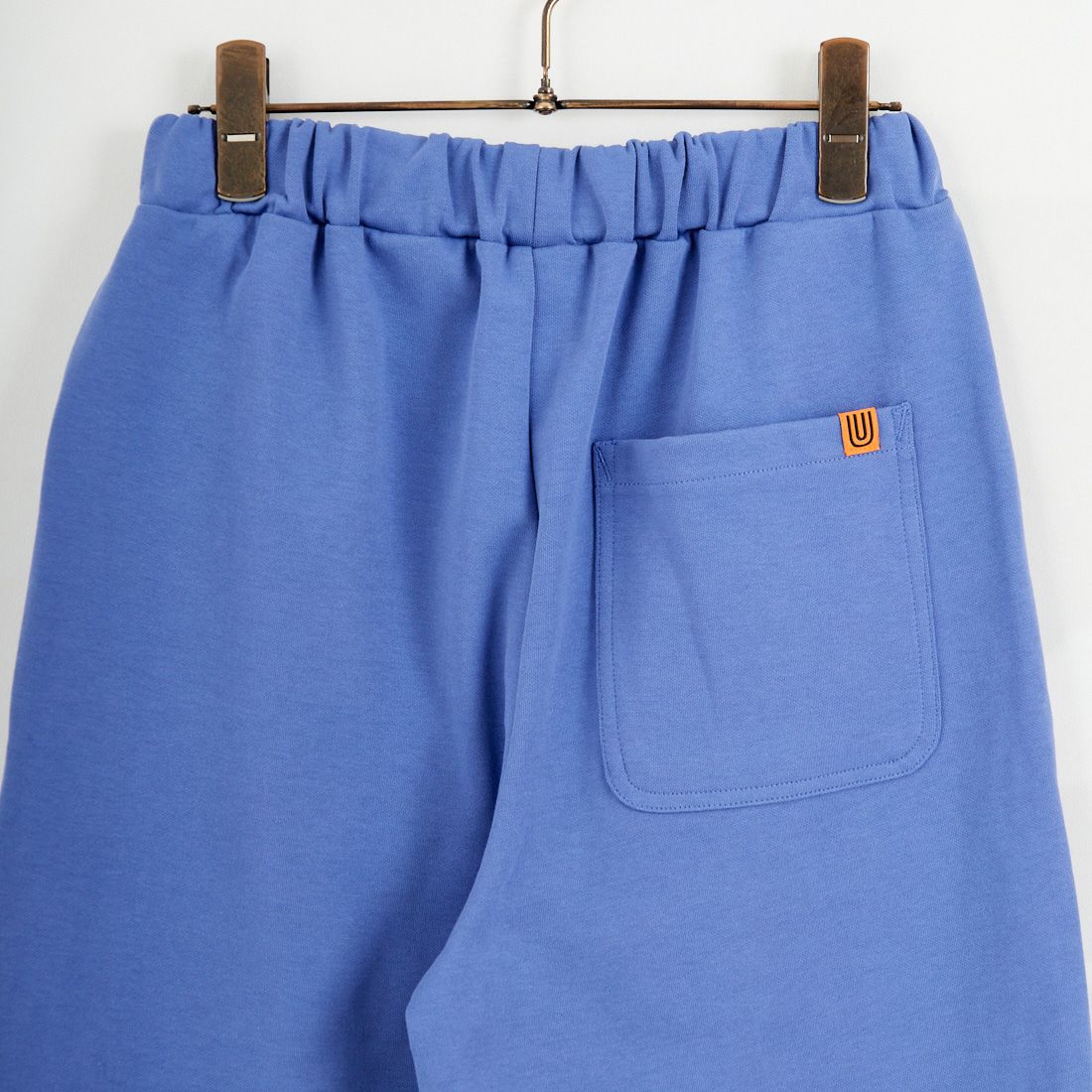 UNIVERSAL OVERALL [ユニバーサルオーバーオール] 別注 ポンチスウェットイージーパンツ [U2422601IN-JF] BLUE
