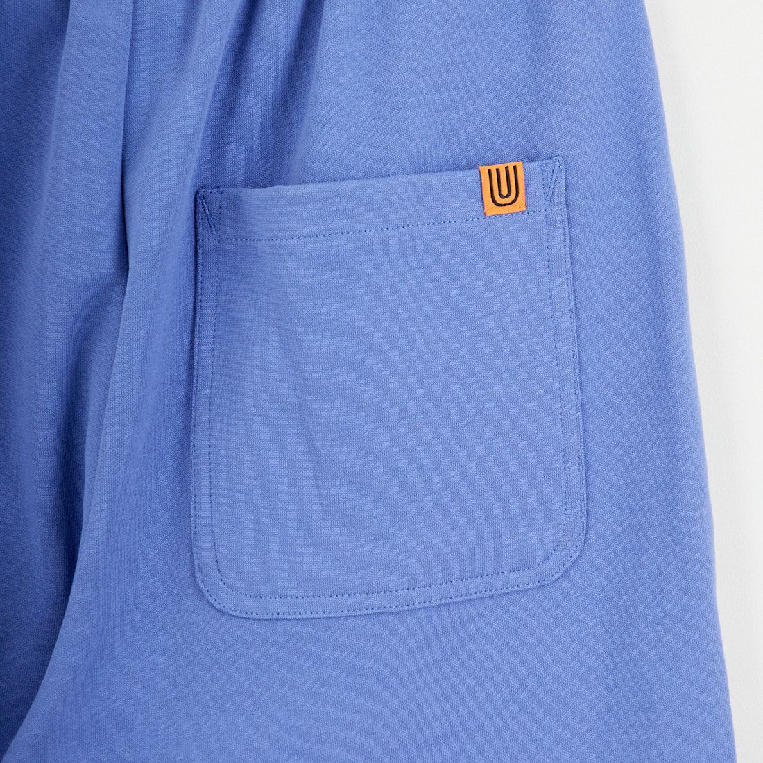 UNIVERSAL OVERALL [ユニバーサルオーバーオール] 別注 ポンチスウェットイージーパンツ [U2422601IN-JF] BLUE