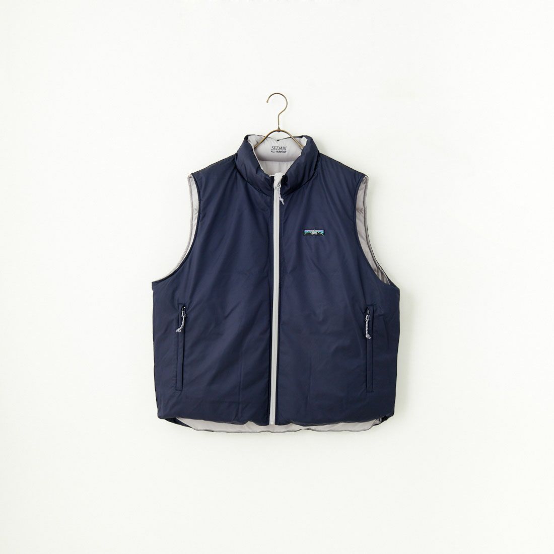 SEDAN ALL-PURPOSE [セダン オールパーパス] リバーシブルダウンベスト [SD24F-JK02] STONE/NVY