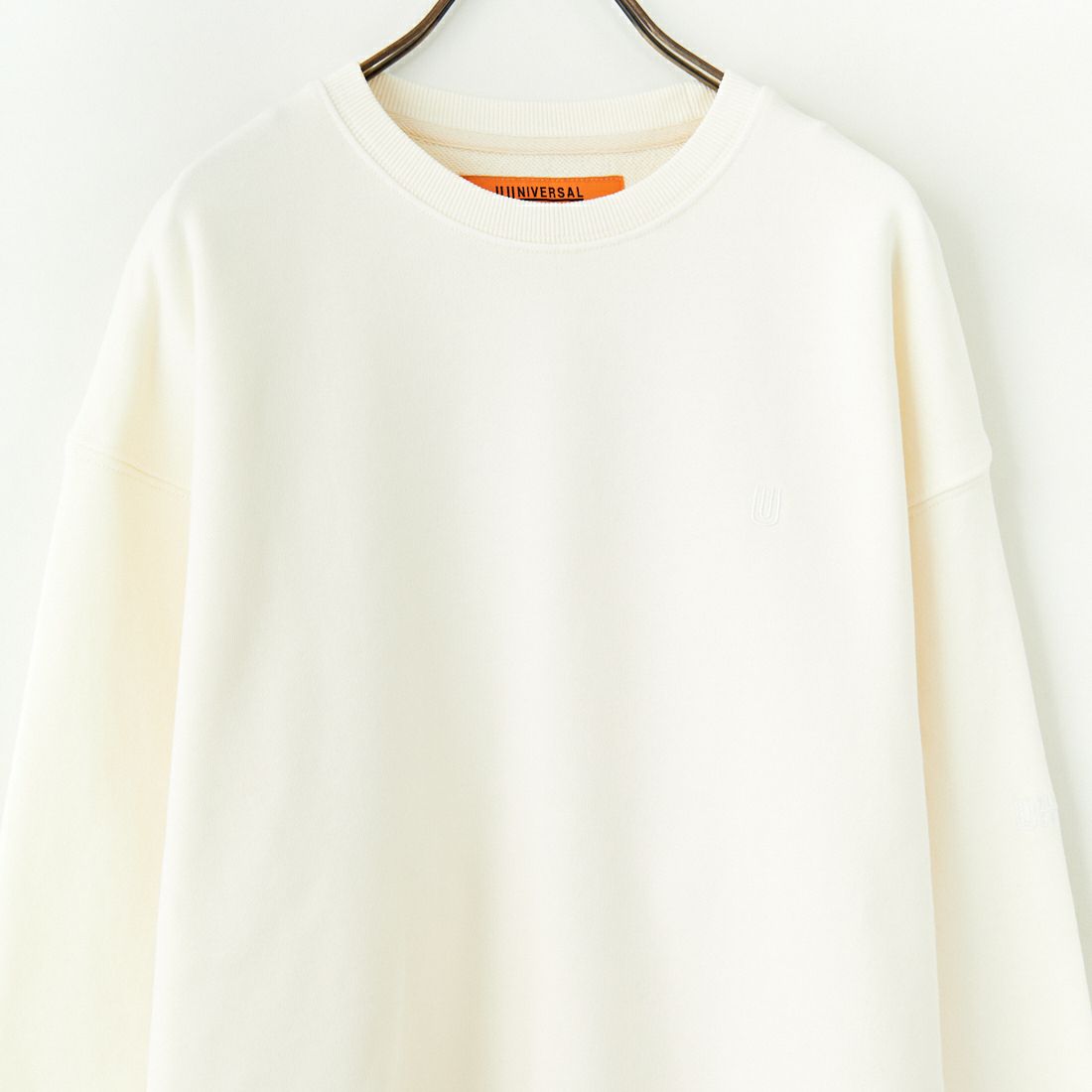 UNIVERSAL OVERALL [ユニバーサルオーバーオール] 別注 ピグメント染め ワンポイントロゴ刺繍クルーネックスウェット [U2511228IN-JF] IVORY