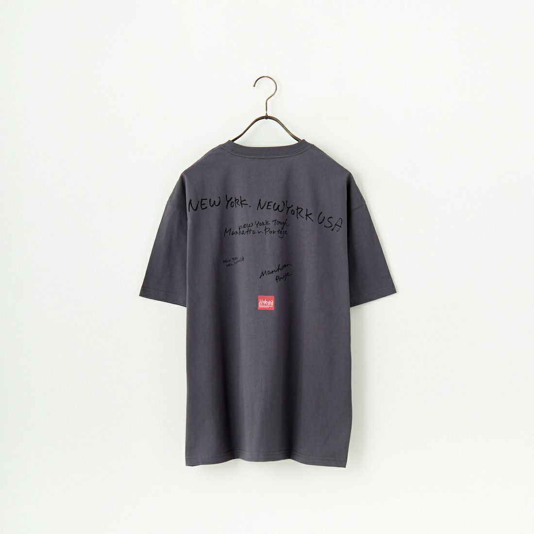 MANHATTAN PORTAGE [マンハッタンポーテージ] 別注 ランダムロゴ バックプリントTシャツ [25SSMP-IN66-JF] CHARCOAL