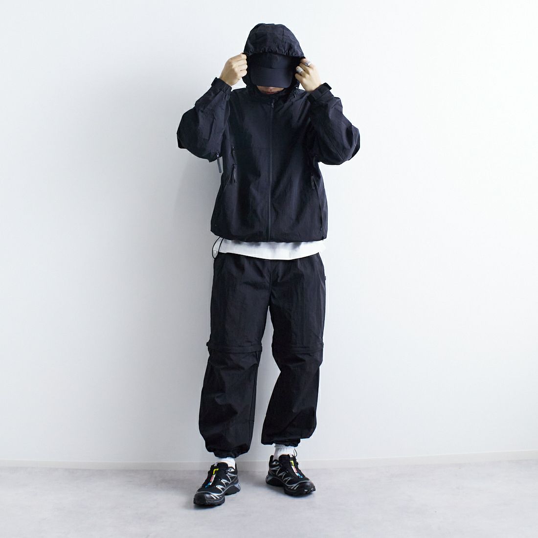 +phenix [プラスフェニックス] 別注 2WAY ナイロンタッサーコンバーチブルパンツ [POB-25007IN-JF] BLACK &&モデル身長：179cm 着用サイズ：L&&