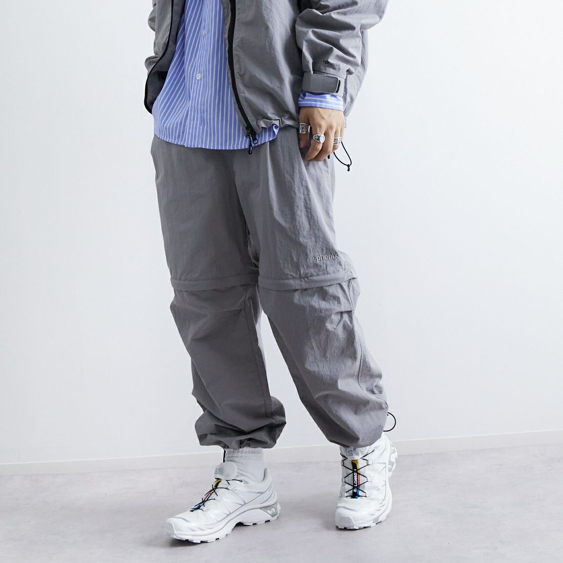 +phenix [プラスフェニックス] 別注 2WAY ナイロンタッサーコンバーチブルパンツ [POB-25007IN-JF] GRAY &&モデル身長：179cm 着用サイズ：L&&