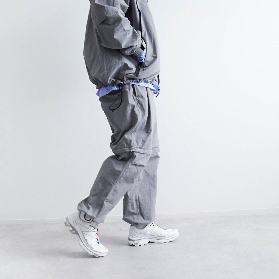 +phenix [プラスフェニックス] 別注 2WAY ナイロンタッサーコンバーチブルパンツ [POB-25007IN-JF] GRAY &&モデル身長：179cm 着用サイズ：L&&