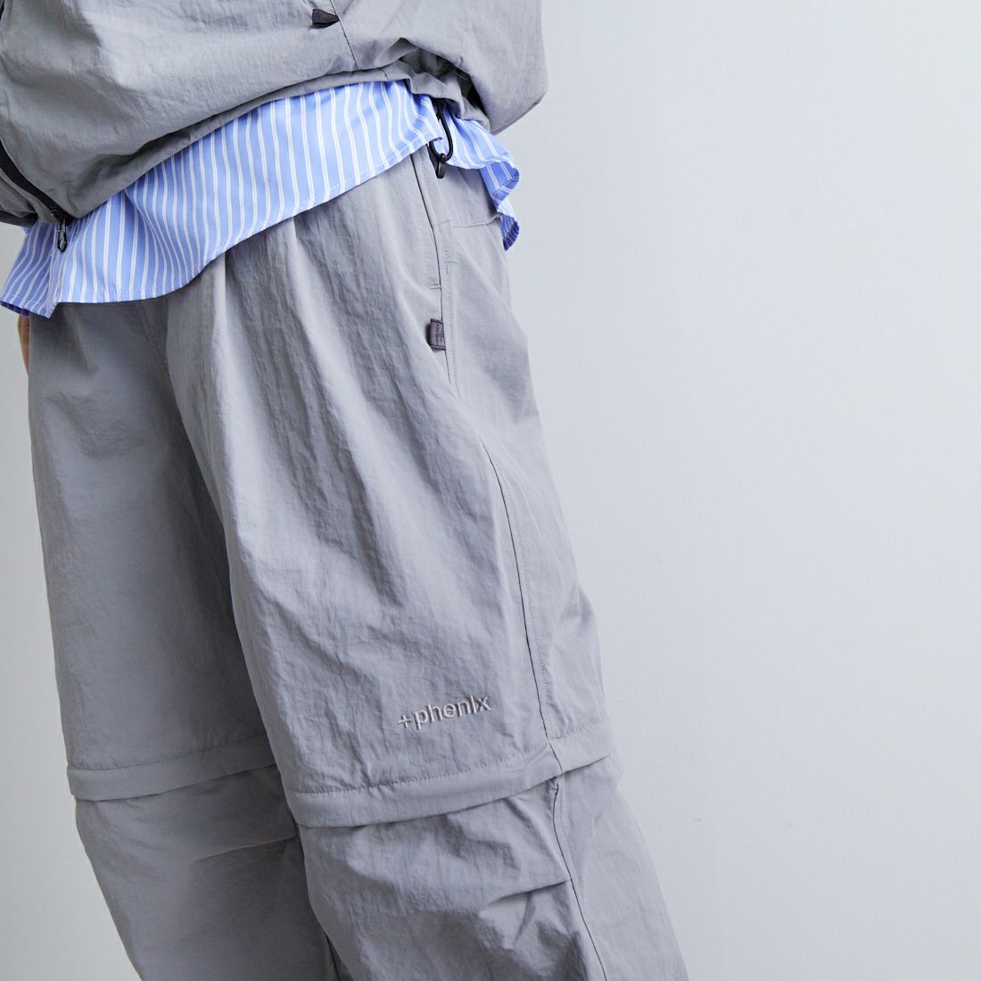 +phenix [プラスフェニックス] 別注 2WAY ナイロンタッサーコンバーチブルパンツ [POB-25007IN-JF] GRAY &&モデル身長：179cm 着用サイズ：L&&