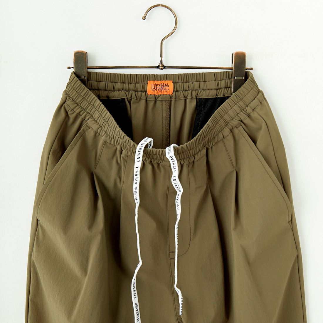 UNIVERSAL OVERALL [ユニバーサルオーバーオール] 別注 ストレッチナイロンイージーパンツ [U2513606IN-JF] OLIVE