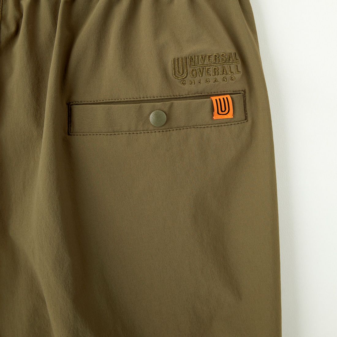 UNIVERSAL OVERALL [ユニバーサルオーバーオール] 別注 ストレッチナイロンイージーパンツ [U2513606IN-JF] OLIVE