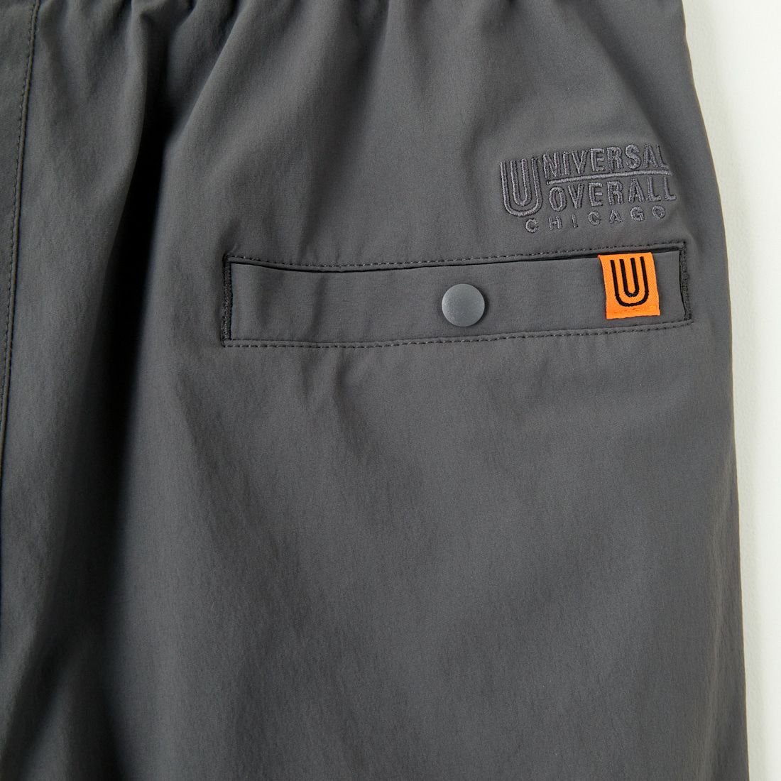 UNIVERSAL OVERALL [ユニバーサルオーバーオール] 別注 ストレッチナイロンイージーパンツ [U2513606IN-JF] CHARCOAL