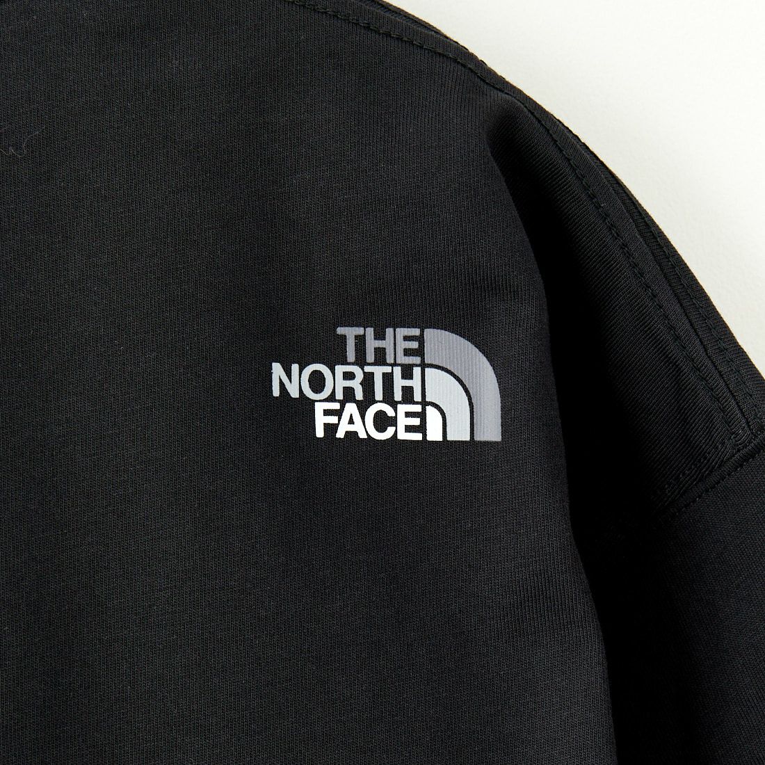 THE NORTH FACE [ザ ノースフェイス] ショートスリーブ フラッシュドライ カラフルロゴコットンTシャツ [NT32539] K