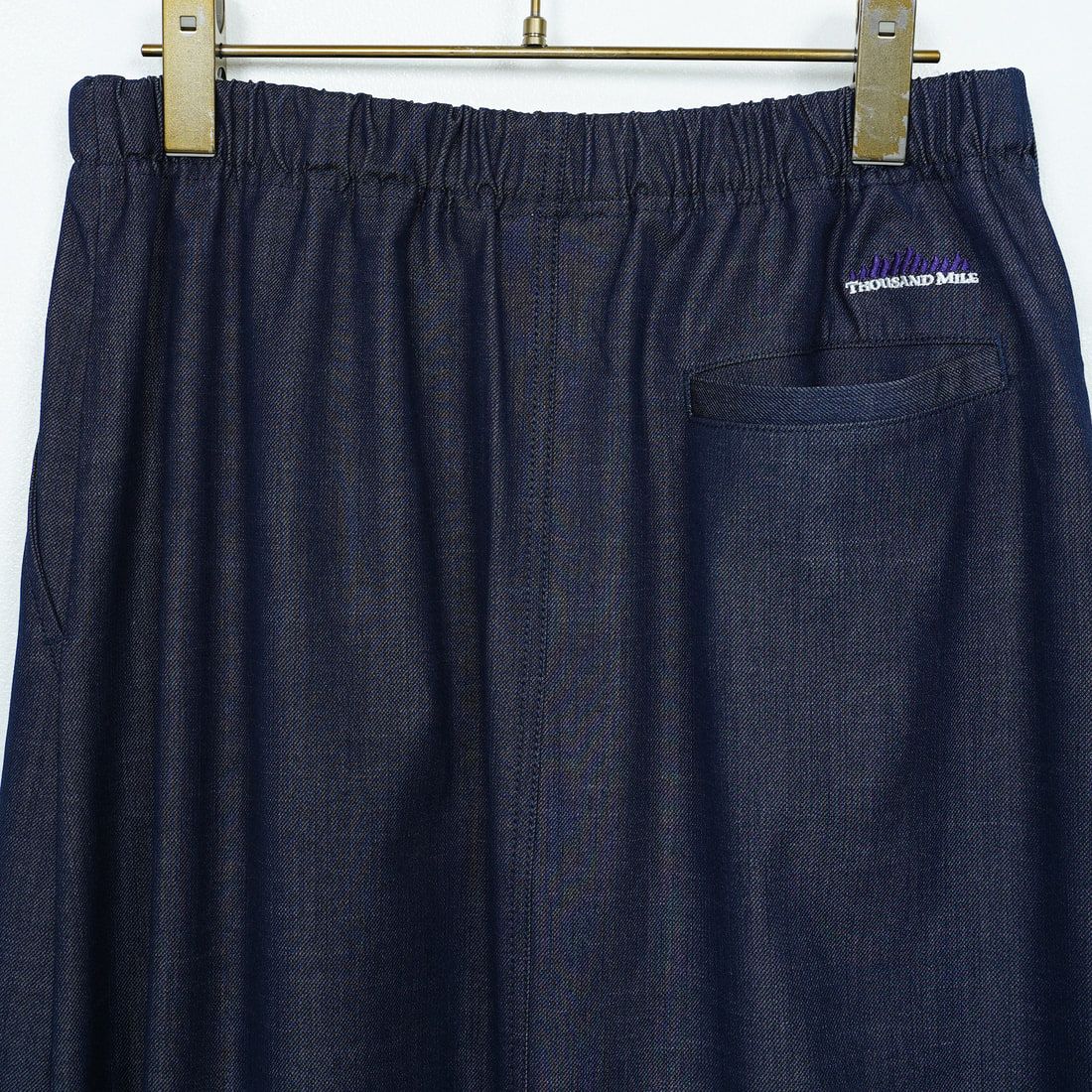 THOUSAND MILE [サウザンド マイル] ウェーブアジャストスカート [TM251TD00352] NAVY