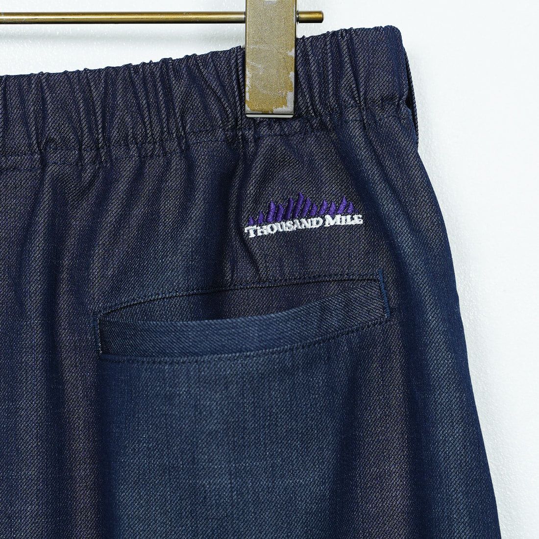 THOUSAND MILE [サウザンド マイル] ウェーブアジャストスカート [TM251TD00352] NAVY