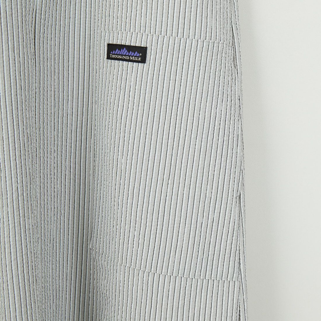 THOUSAND MILE [サウザンド マイル] 別注 ストライプ柄 シアサッカーハーフジップノースリーブワンピース [TM251ST50962-JF] GRAY ST