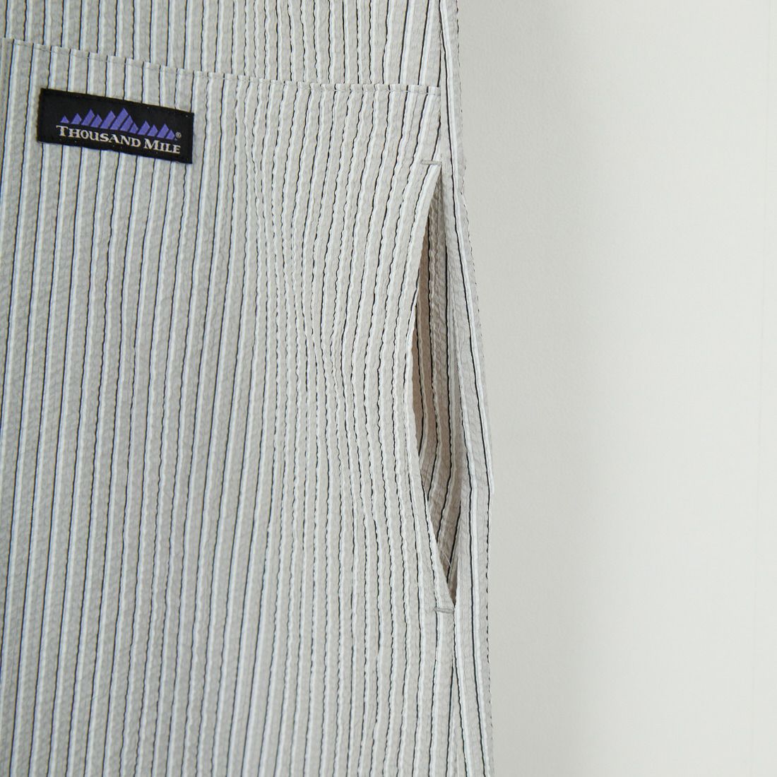 THOUSAND MILE [サウザンド マイル] 別注 ストライプ柄 シアサッカーハーフジップノースリーブワンピース [TM251ST50962-JF] GRAY ST