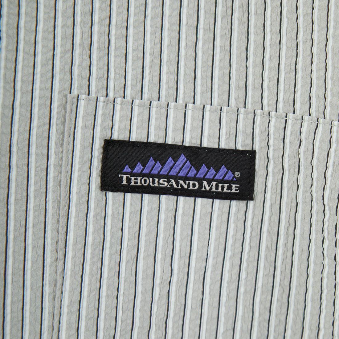 THOUSAND MILE [サウザンド マイル] 別注 ストライプ柄 シアサッカーハーフジップノースリーブワンピース [TM251ST50962-JF] GRAY ST
