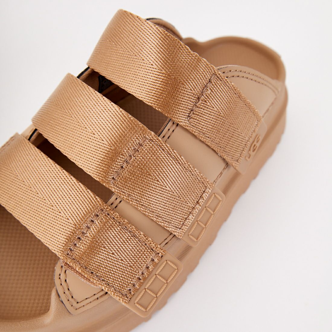 UGG [アグ] GOLDENGLOW SLIDE [1167430] DARK SAND