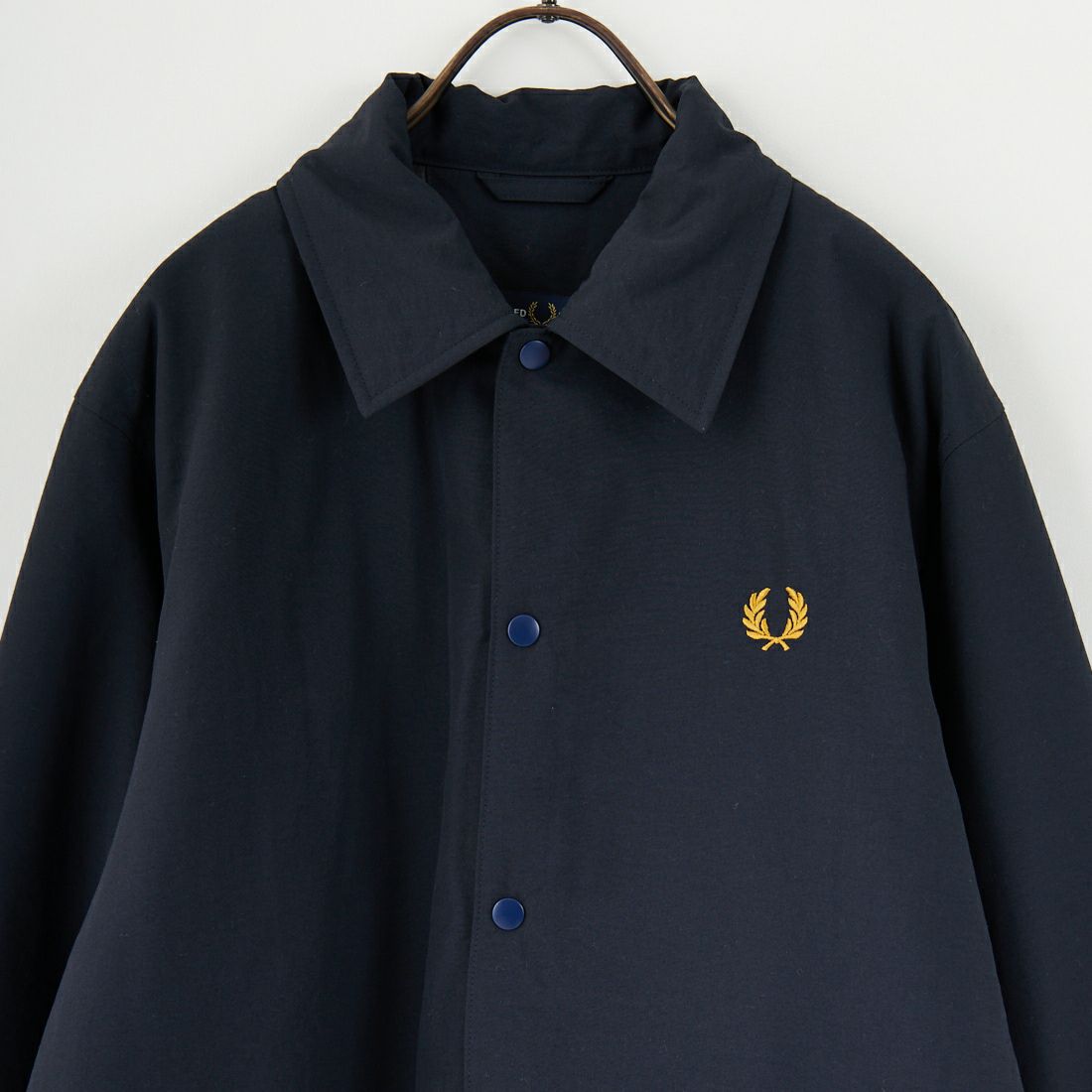 FRED PERRY [フレッドペリー] 別注 パデッドボタンスルージャケット [FPM-25A-23JF] NVY/HONEYC