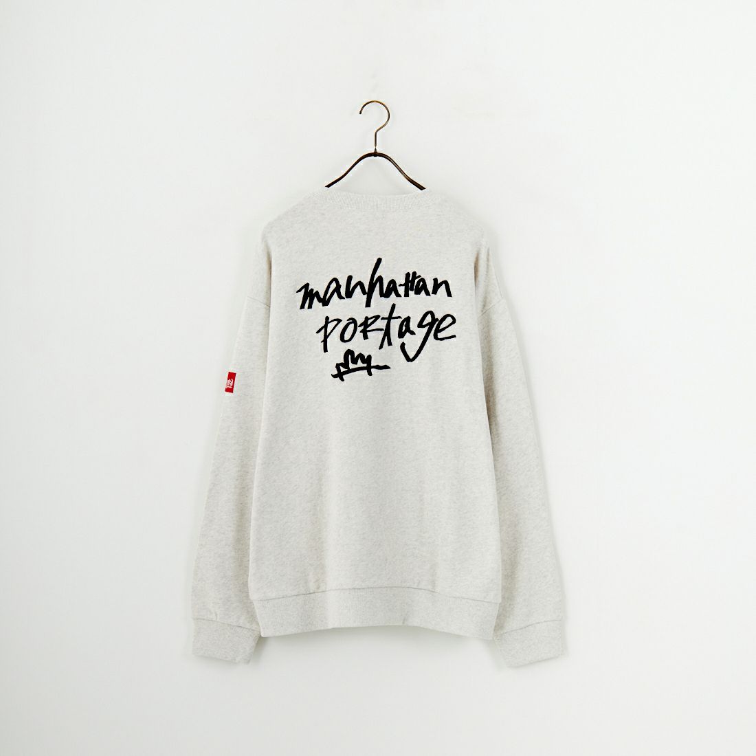 MANHATTAN PORTAGE [マンハッタンポーテージ] 別注 手書き風バック刺繍クルーネックスウェット [25FWMP-IN69-JF] OATMEAL