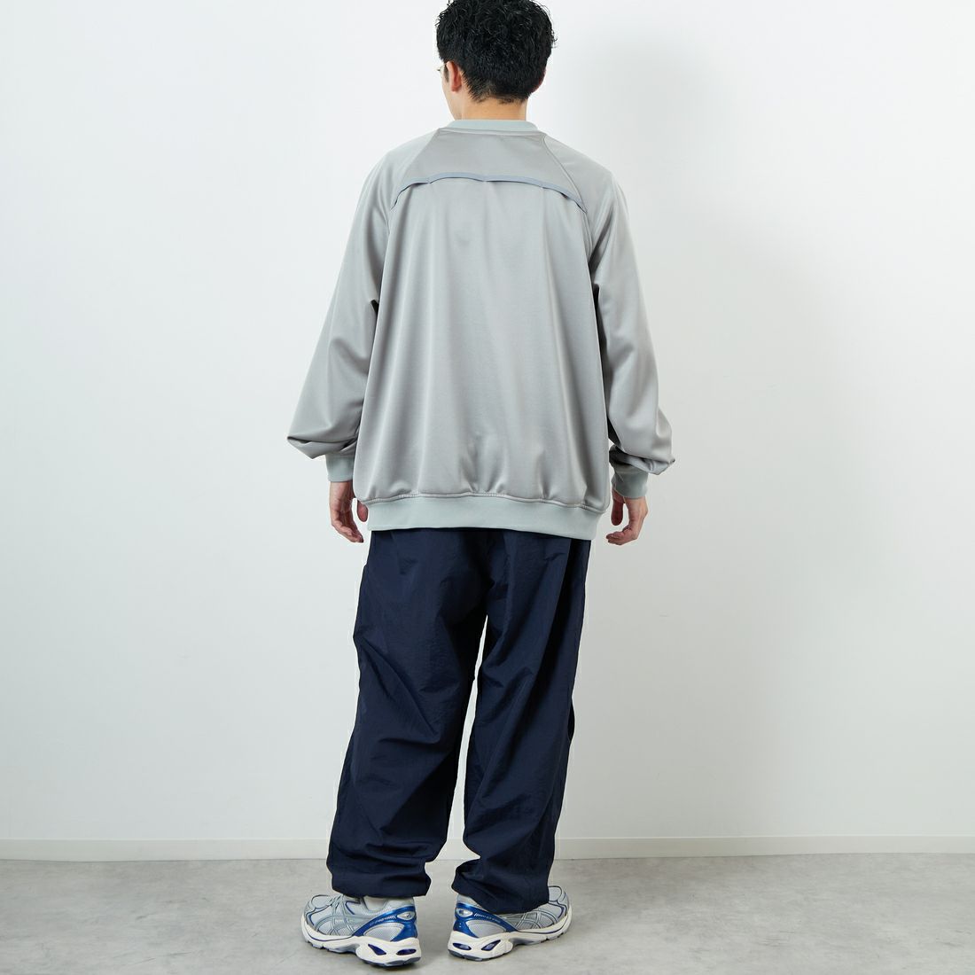 UMBRO [アンブロ] 別注 ナイロントラックパンツ [KBT126-NK-PT1-MS-JF] NAVY &&モデル身長：167cm 着用サイズ：XL&&