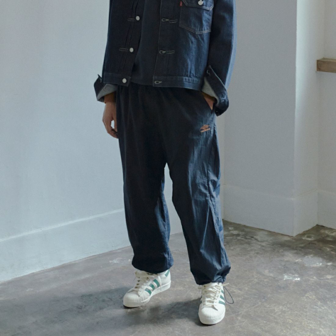 UMBRO [アンブロ] 別注 ナイロントラックパンツ [KBT126-NK-PT1-MS-JF] NAVY