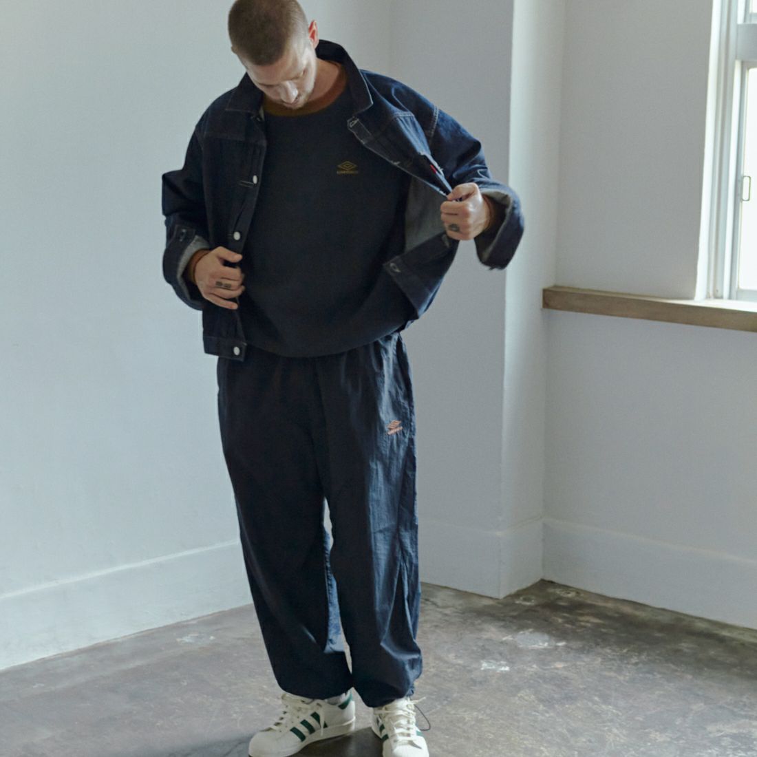 UMBRO [アンブロ] 別注 ナイロントラックパンツ [KBT126-NK-PT1-MS-JF] NAVY