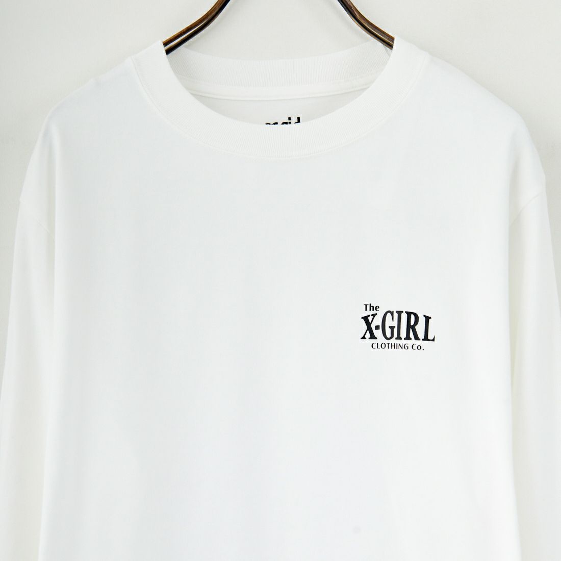 X-girl [エックスガール] オーナメントフェイス ロングスリーブTシャツ [105253011015] WHITE