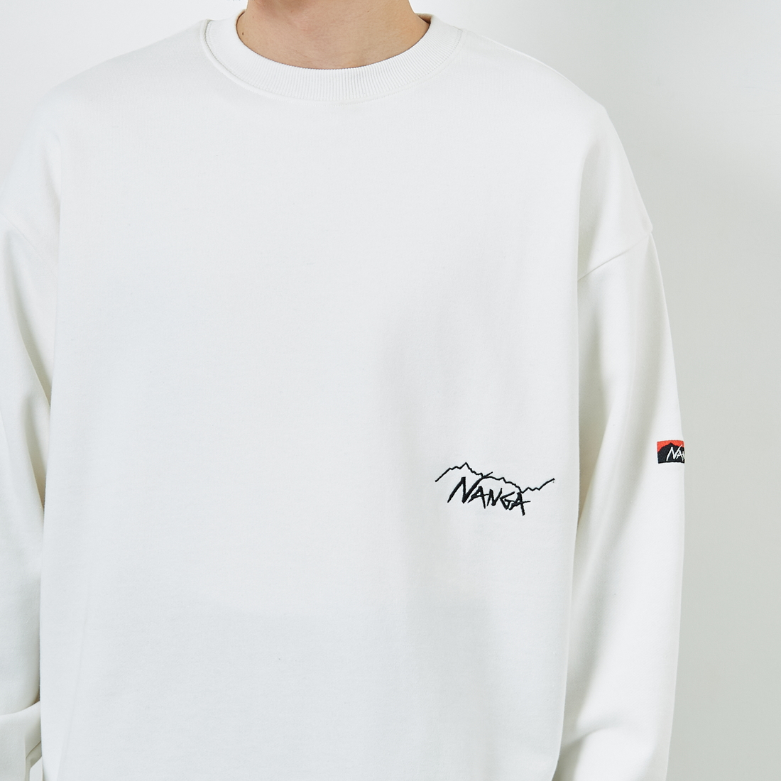 JEANSFACTORY × NANGA [ジーンズファクトリー × ナンガ] 別注 ワンポイント刺繍ロゴ ドローコードスウェット [NW2507-JF] WHITE