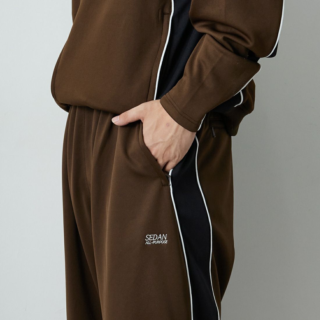 SEDAN ALL-PURPOSE [セダン オールパーパス] OGロゴ トラックパンツ [SD25F-PT05] BRN/BLK