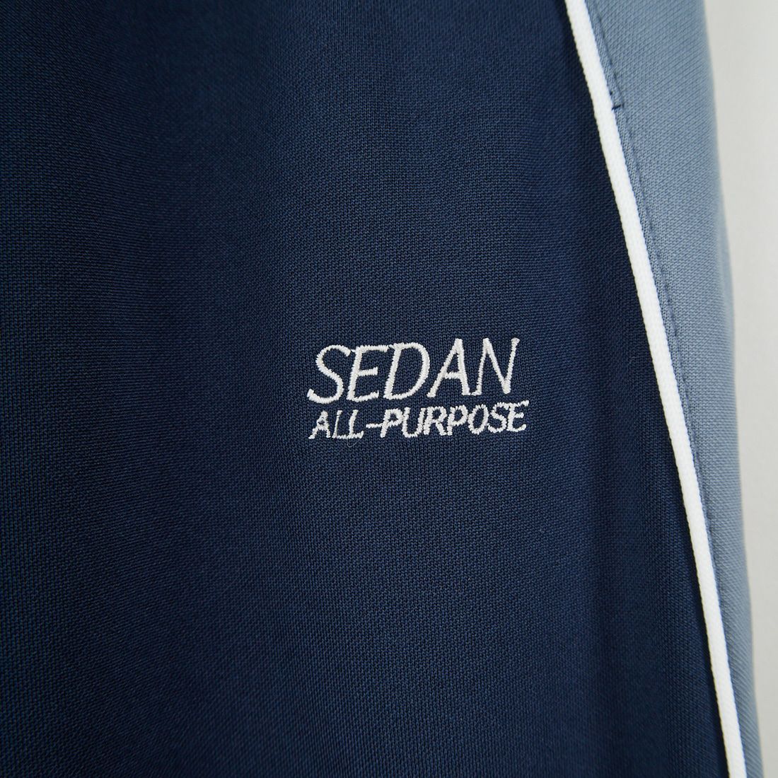 SEDAN ALL-PURPOSE [セダン オールパーパス] OGロゴ トラックパンツ [SD25F-PT05] NVY/GRY