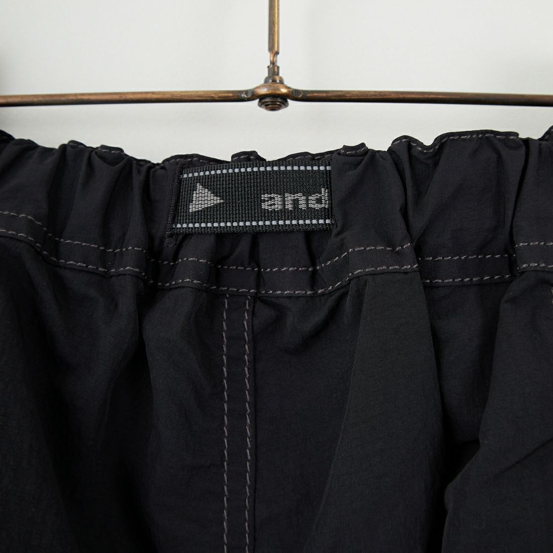 and wander [アンドワンダー] クリンクルドナイロンパンツ [5745282076] BLACK
