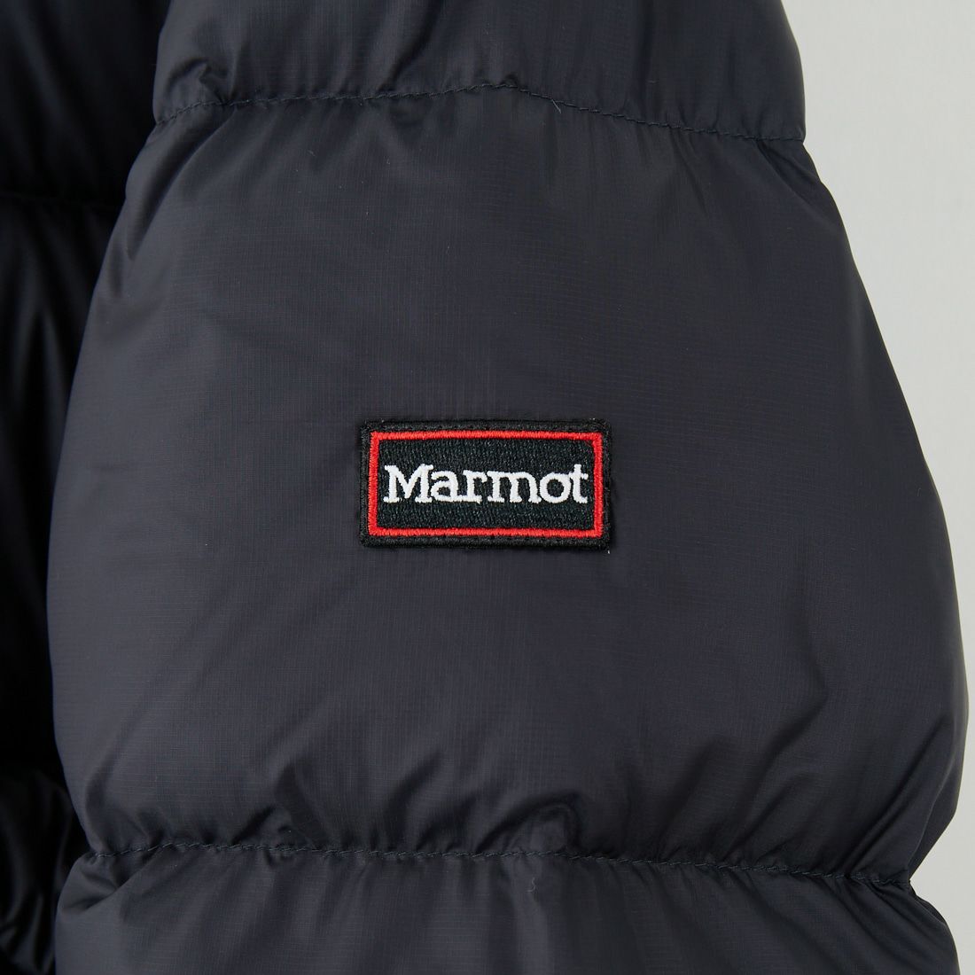 Marmot [マーモット] 別注 ワンポイントロゴ ダウンジャケット [MTFW25UDW329IN-JF] BLACK