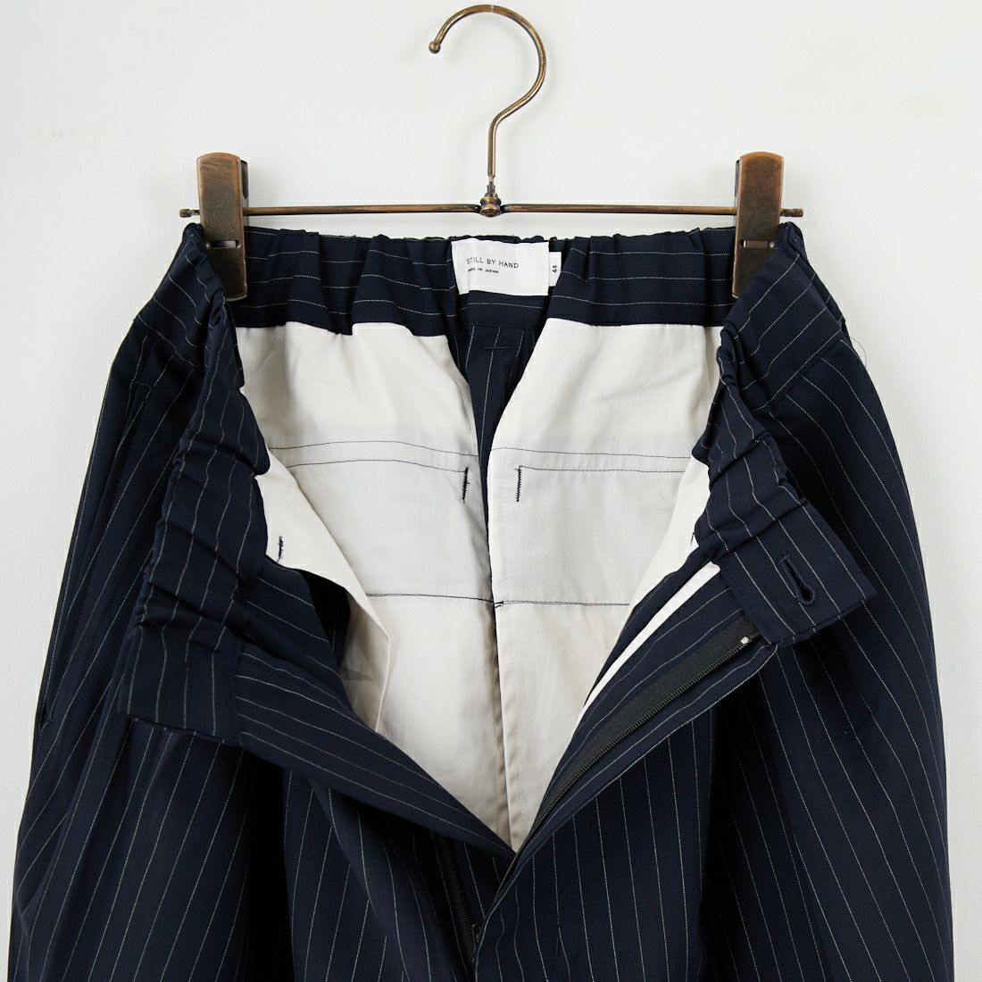 STILL BY HAND [スティルバイハンド] 別注 ウールツータックパンツ [2503JF-EX08-JF] NAVY ST