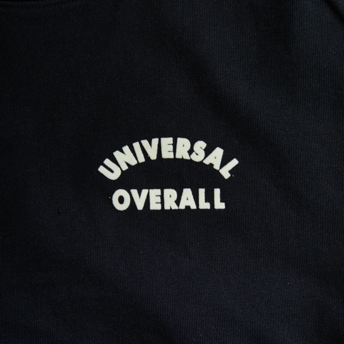 UNIVERSAL OVERALL [ユニバーサルオーバーオール] 別注 ワンポイントロゴ刺繍 ラグランスリーブスウェット [U2532201IN-JF] BLACK