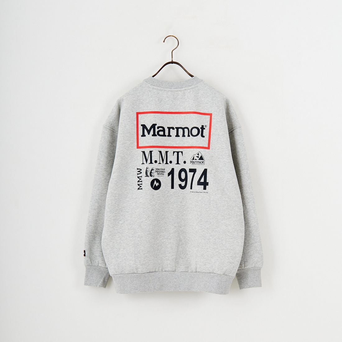 Marmot [マーモット] 別注 ヒストリーロゴ バックプリントスウェット [MTFW25USW363IN-JF] TOP GRAY