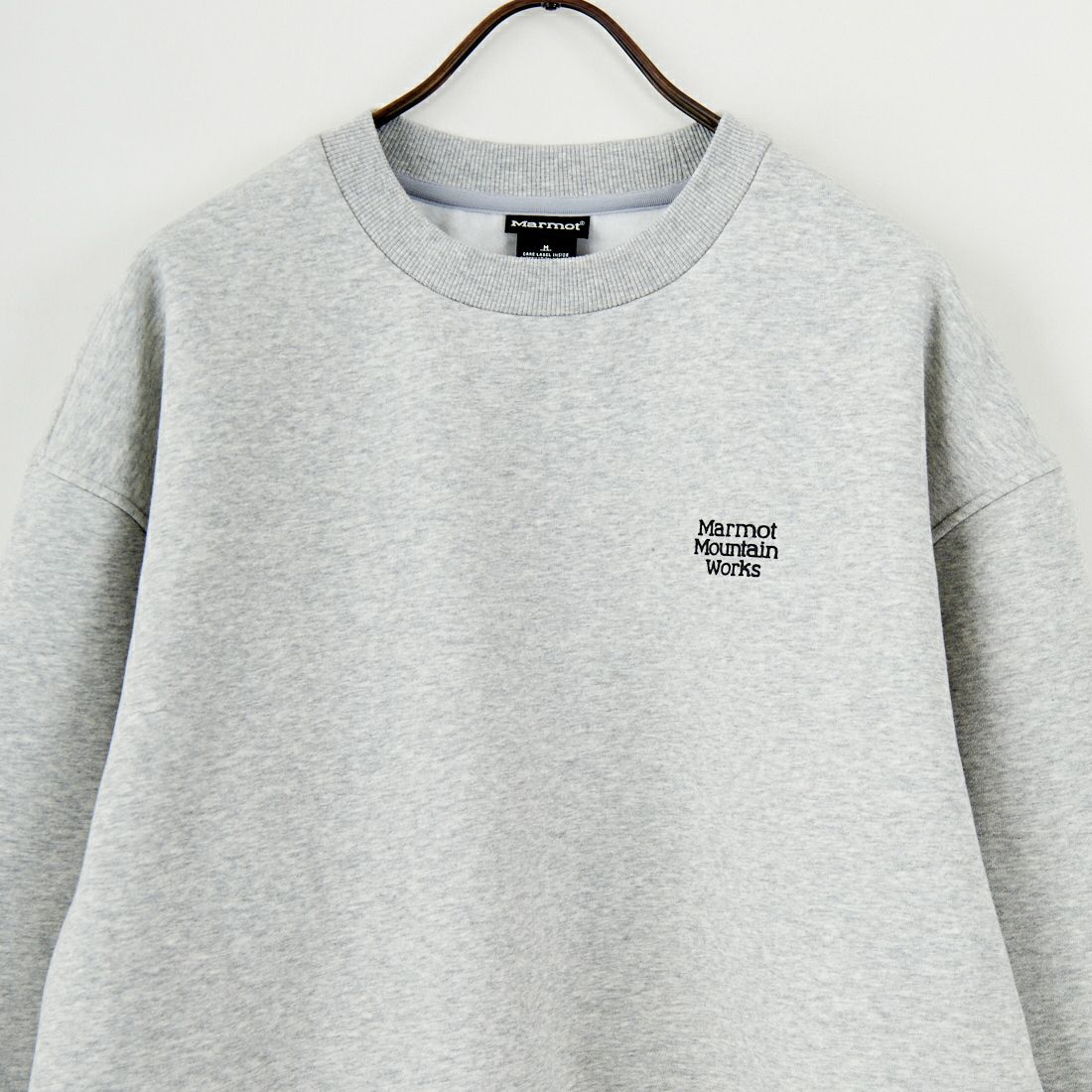 Marmot [マーモット] 別注 ヒストリーロゴ バックプリントスウェット [MTFW25USW363IN-JF] TOP GRAY